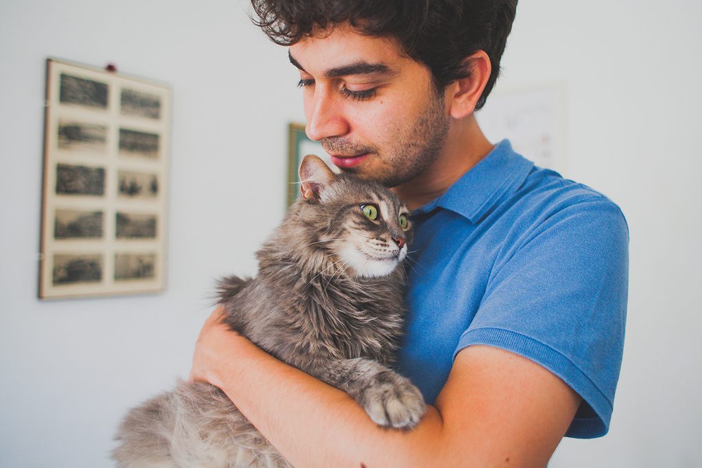 person with cat 1